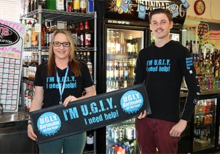 Club Hotel bartenders taking part in the U.G.L.Y Bartender fundraiser.